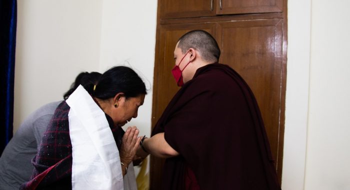 Thaye Dorje, His Holiness the 17th Gyalwa Karmapa, with the family of his late teacher, Professor Sempa Dorje. Photo / Lekshey jorden