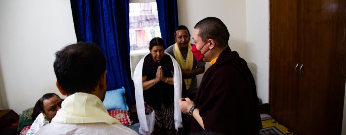 Thaye Dorje, His Holiness the 17th Gyalwa Karmapa, with the family of his late teacher, Professor Sempa Dorje. Photo / Lekshey jorden