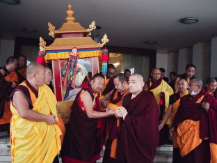 Thaye Dorje, His Holiness the 17th Gyalwa Karmapa, receives the Kudung of his father, the eminent spiritual master His Eminence the 3rd Jamgon Ju Mipham Namgyal Gyatso Tshojung Gyepe Dorje, at the Karmapa International Buddhist Institute in New Delhi. Photo: Tokpa Korlo.