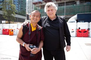 Karmapa's students and photographers attend a traditional fish release ceremony in Hong Kong