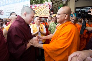 Thaye Dorje, His Holiness the 17th Gyalwa Karmapa greeting the Chief Venerable of the Buddhist Maha Vihara, Ven. Ming Ji, Chairman of MBA Selangor State, in Malaysia 2016. Photo / Magda Jungowska