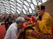 Thaye Dorje, His Holiness the 17th Gyalwa Karmapa, blessing an attendee