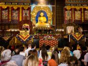 Thaye Dorje, His Holiness the 17th Gyalwa Karmapa, with photo of his teacher, His Holiness Kunzig Shamar Rinpoche, on the throne, during an empowerment in March 2017. Photo / Norbu Zangpo