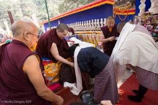 Yab Mr Chencho and Yum Mrs Kunzang, Sangyumla's parents, take a blessing from Thaye Dorje, His Holiness the 17th Gyalwa Karmapa