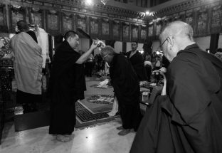 Thaye Dorje, His Holiness the 17th Gyalwa Karmapa blesses Lama Jigme Rinpoche during the Chenresig empowerment at the KIBI Public Course