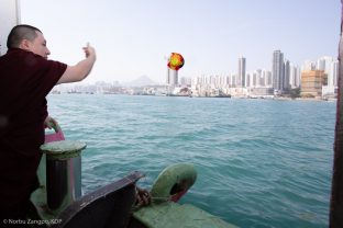 Thaye Dorje, His Holiness the 17th Gyalwa Karmapa, performs a traditional fish release ceremony in Hong Kong