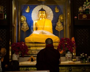 Thaye Dorje, His Holiness the 17th Gyalwa Karmapa, presides over prayers on the opening day of the Kagyu Monlam in Bodh Gaya, India, in December 2019 (Photo/Norbu Zangpo)