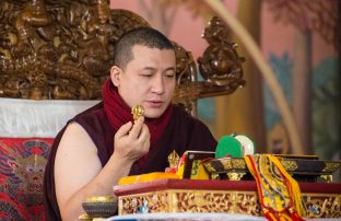 Thaye Dorje, His Holiness the 17th Gyalwa Karmapa, presides over a fire puja at His Eminence Beru Khyentse Rinpoche's guest house, India, December 2019. Photo / Norbu Zangpo