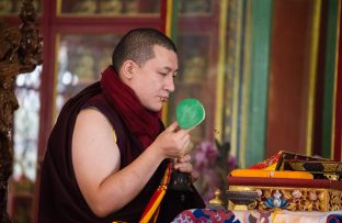 Thaye Dorje, His Holiness the 17th Gyalwa Karmapa, presides over a fire puja at His Eminence Beru Khyentse Rinpoche's guest house, India, December 2019. Photo / Norbu Zangpo