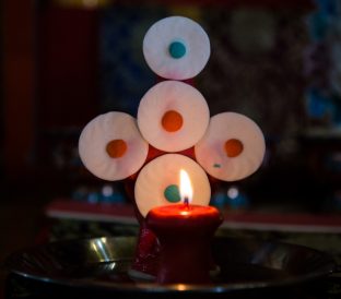 Thaye Dorje, His Holiness the 17th Gyalwa Karmapa, presides over a fire puja at His Eminence Beru Khyentse Rinpoche's guest house, India, December 2019. Photo / Norbu Zangpo