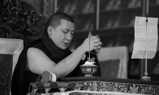 Thaye Dorje, His Holiness the 17th Gyalwa Karmapa, presides over a fire puja at His Eminence Beru Khyentse Rinpoche's guest house, India, December 2019. Photo / Norbu Zangpo