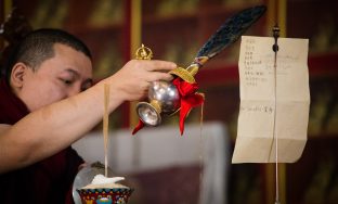 Thaye Dorje, His Holiness the 17th Gyalwa Karmapa, presides over a fire puja at His Eminence Beru Khyentse Rinpoche's guest house, India, December 2019. Photo / Norbu Zangpo