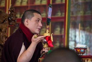 Thaye Dorje, His Holiness the 17th Gyalwa Karmapa, presides over a fire puja at His Eminence Beru Khyentse Rinpoche's guest house, India, December 2019. Photo / Norbu Zangpo