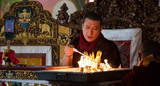 Thaye Dorje, His Holiness the 17th Gyalwa Karmapa, presides over a fire puja at His Eminence Beru Khyentse Rinpoche's guest house, India, December 2019. Photo / Norbu Zangpo