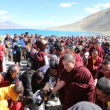 Thaye Dorje, His Holiness the 17th Gyalwa Karmapa, blesses devotees at Pangong Lake. Photo / Magda Jungowska