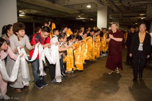 Two groups of students meet Thaye Dorje, His Holiness the 17th Gyalwa Karmapa, before the Chenresig empowerment