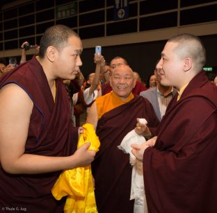 His Eminence 4th Jamgon Kongtrul Rinpoche greets Thaye Dorje, His Holiness the 17th Gyalwa Karmapa