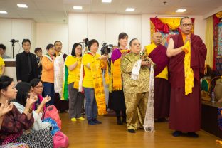 Students and visitors offer gifts and receive blessings from Thaye Dorje, His Holiness the 17th Gyalwa Karmapa, at Khenpo Karsang’s Kagyu Library in Hong Kong
