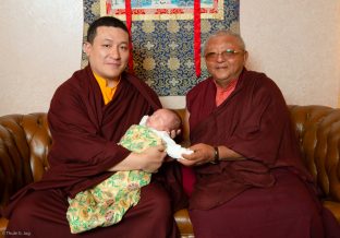 Thaye Dorje, His Holiness the 17th Gyalwa Karmapa, introduces Thugsey (his son) to Jigme Rinpoche, Karmapa's General Secretary