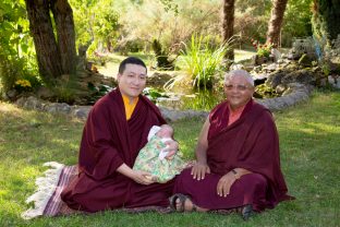 Thaye Dorje, His Holiness the 17th Gyalwa Karmapa, rests with Jigme Rinpoche, Karmapa's General Secretary, while Thugsey (his son) also takes a rest