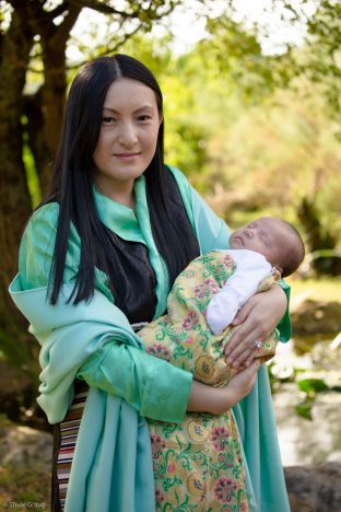 Sangyumla Rinchen Yangzom cradles Thugsey (her son)