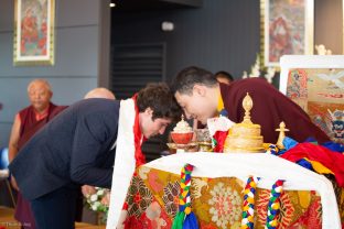 Thaye Dorje, His Holiness the 17th Gyalwa Karmapa, blesses Gendun Rinchen, Yangsi of Gendun Rinpoche, during a special reception at Dhagpo Kagyu Ling