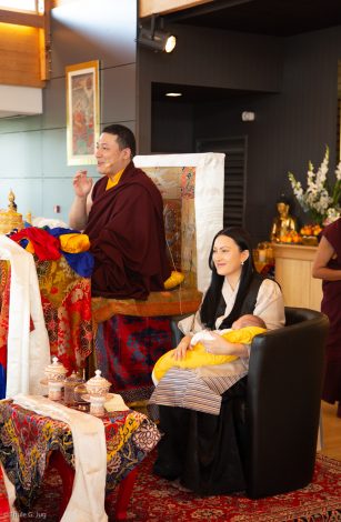 Thaye Dorje, His Holiness the 17th Gyalwa Karmapa, with his wife Sangyumla Rinchen Yangzom and Thugsey (their son) by his side during a special reception at Dhagpo Kagyu Ling