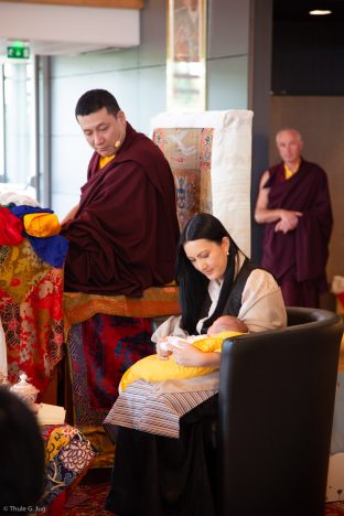 Thaye Dorje, His Holiness the 17th Gyalwa Karmapa, with his wife Sangyumla Rinchen Yangzom and Thugsey (their son) by his side during a special reception at Dhagpo Kagyu Ling