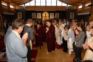 Thaye Dorje, His Holiness the 17th Gyalwa Karmapa, bids farewell to members of the Dhagpo community