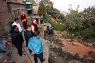 Mr Roshan and others showed Karmapa the building site and shared the progress of the work.