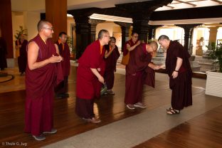 Karmapa is welcomed by Shangpa Rinpoche, Lodro Rinpoche, and Khenpo Lekshey