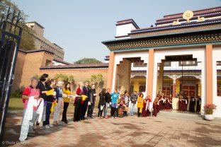 Students and monks keenly await Karmapa's arrival at KIBI