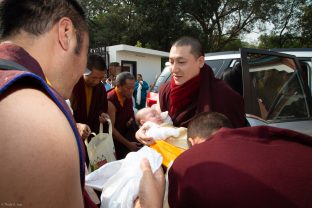 Karmapa and his four month old son Thugsey arrive at KIBI