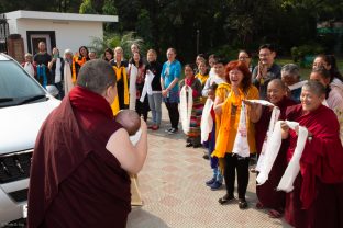 The crowd delights at the arrival of Karmapa and baby Thugsey