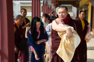 Karmapa, Sangyumla Rinchen Yangzom and their son Thugsey arrive at KIBI.