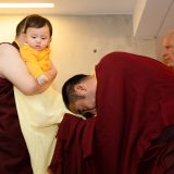 Students from Germany and around the world say goodbye as Thaye Dorje, His Holiness the 17th Gyalwa Karmapa, and his son Thugseyla leave the Europe Centre.