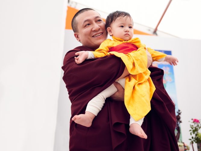 Thaye Dorje, His Holiness the 17th Gyalwa Karmapa, and baby Thugseyla