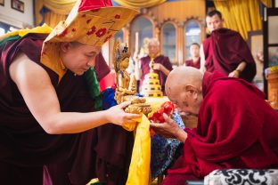 With humble appreciation, Karmapa offered His Eminence Luding Khenchen Rinpoche a mandala, a symbolic offering of body, speech and mind, together with other auspicious offerings