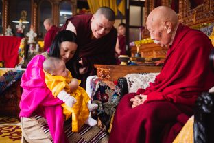 His Eminence Luding Khenchen Rinpoche and Thugsey look into each other's eyes during the historic hair-cutting ceremony