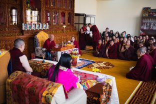 His Eminence Luding Khenchen Rinpoche, a pre-eminent spiritual master and lineage holder, in the shrine room at Karmapa International Buddhist Institute (KIBI)