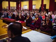 Students pray at KIBI earlier this year