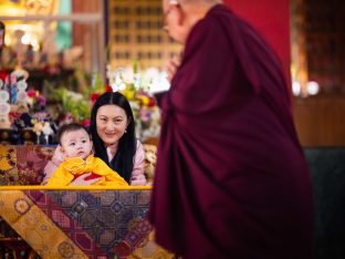 Sangyumla and Thugsey are greeted by Solponla Tsultrim Namgyal, Karmapa's Senior Attendant