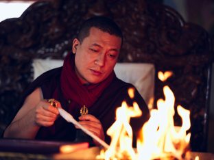 Thaye Dorje, His Holiness the 17th Gyalwa Karmapa, presides over a fire puja at His Eminence Beru Khyentse Rinpoche's guest house, India, December 2019. Photo / Tokpa Korlo