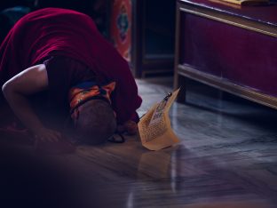 Thaye Dorje, His Holiness the 17th Gyalwa Karmapa, presides over a fire puja at His Eminence Beru Khyentse Rinpoche's guest house, India, December 2019. Photo / Tokpa Korlo