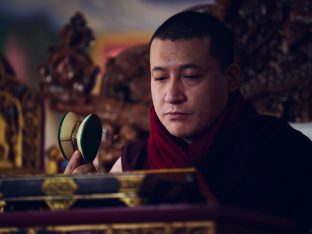 Thaye Dorje, His Holiness the 17th Gyalwa Karmapa, presides over a fire puja at His Eminence Beru Khyentse Rinpoche's guest house, India, December 2019. Photo / Tokpa Korlo