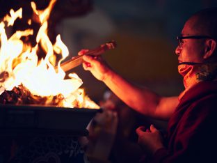 Thaye Dorje, His Holiness the 17th Gyalwa Karmapa, presides over a fire puja at His Eminence Beru Khyentse Rinpoche's guest house, India, December 2019. Photo / Tokpa Korlo