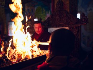 Thaye Dorje, His Holiness the 17th Gyalwa Karmapa, presides over a fire puja at His Eminence Beru Khyentse Rinpoche's guest house, India, December 2019. Photo / Tokpa Korlo