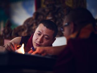 Thaye Dorje, His Holiness the 17th Gyalwa Karmapa, presides over a fire puja at His Eminence Beru Khyentse Rinpoche's guest house, India, December 2019. Photo / Tokpa Korlo