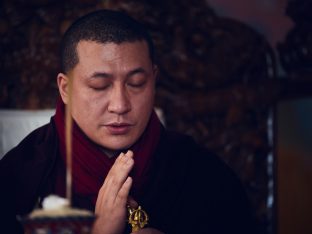 Thaye Dorje, His Holiness the 17th Gyalwa Karmapa, presides over a fire puja at His Eminence Beru Khyentse Rinpoche's guest house, India, December 2019. Photo / Tokpa Korlo