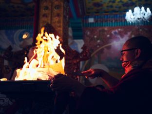 Thaye Dorje, His Holiness the 17th Gyalwa Karmapa, presides over a fire puja at His Eminence Beru Khyentse Rinpoche's guest house, India, December 2019. Photo / Tokpa Korlo